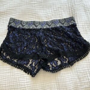Maaji sz L coverup shorts.  Purple and black lace.